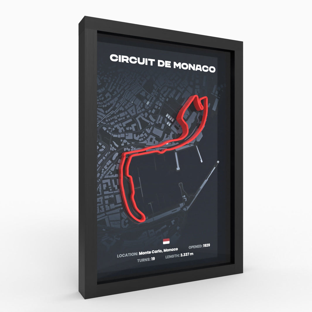 3D-Relief der Rennstrecke Monaco mit roter Strecke und Stadtkarte im schwarzen Holzrahmen, Seitenansicht