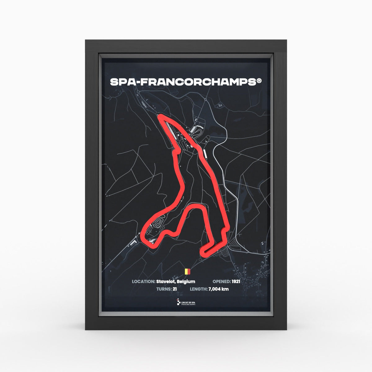 Spa-Francorchamps race track as a red 3D relief on a dark map in a black wooden frame, front view
