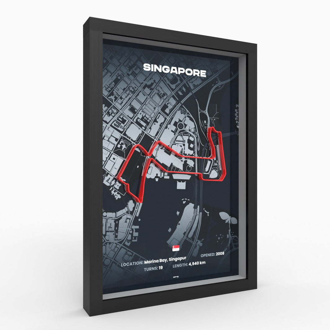 3D-Relief der Rennstrecke Singapur (Marina Bay) in Rot auf dunkler Stadtkarte, schwarzer Holzrahmen, Schrägansicht