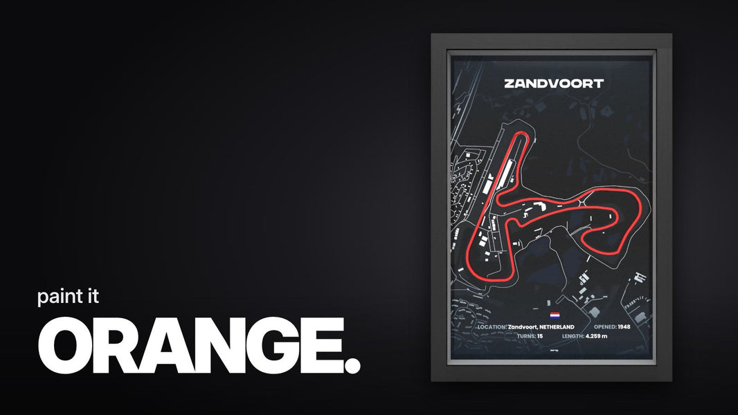 Text 'paint it ORANGE.' above the framed 3D relief of the Zandvoort race track with red track line on a dark map in a black frame.